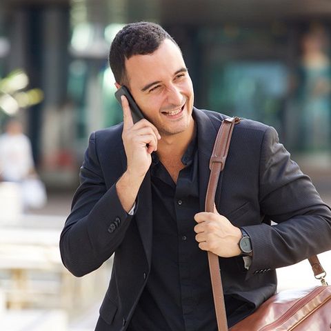 Meeting — Man Answering Phone Call in Spokane, WA Meeting — Man Answering Phone Call in Spokane, WA
