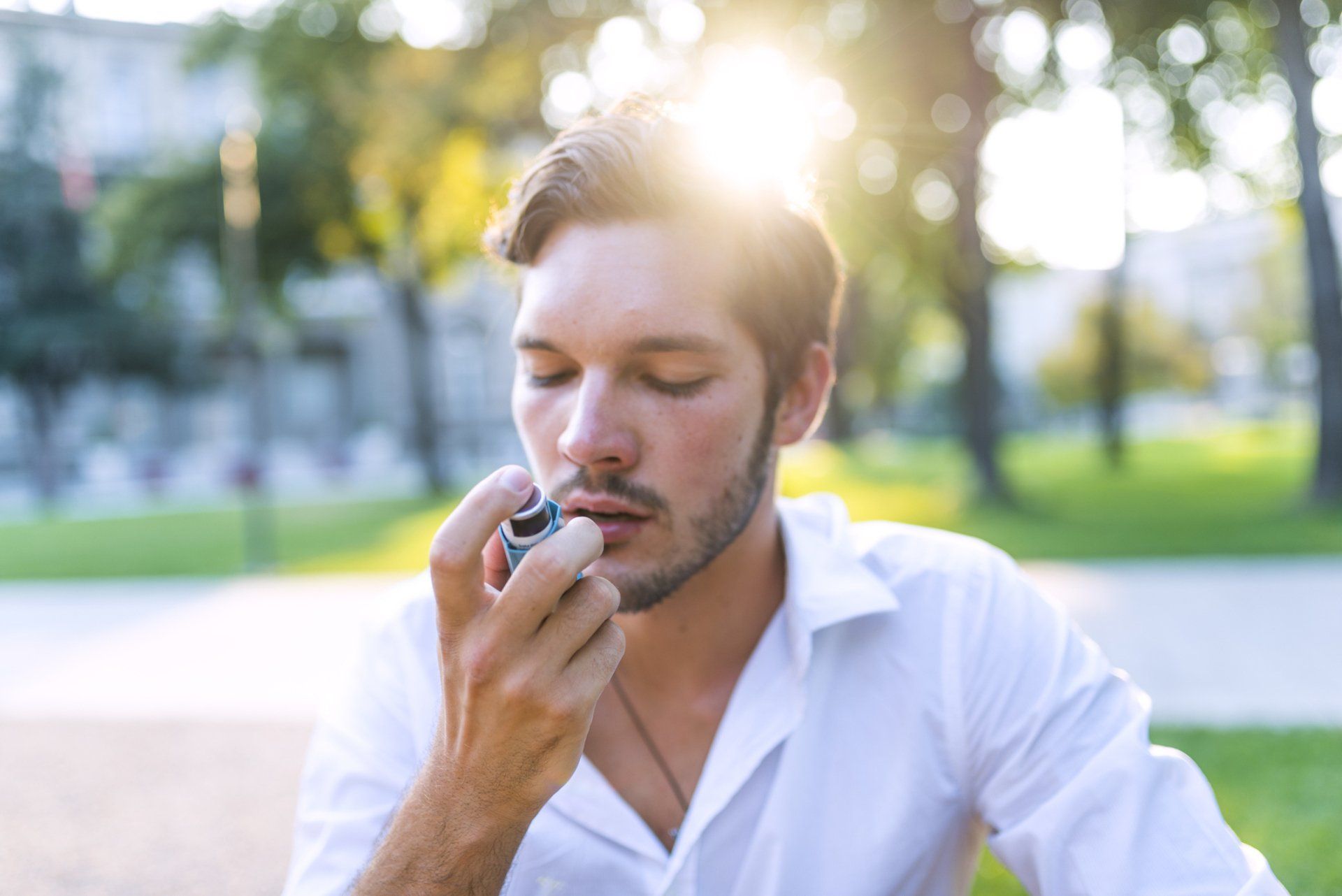 Using Asthma Inhaler At the Park — Hot Springs, AR — Jackson Allergy & Asthma Clinic