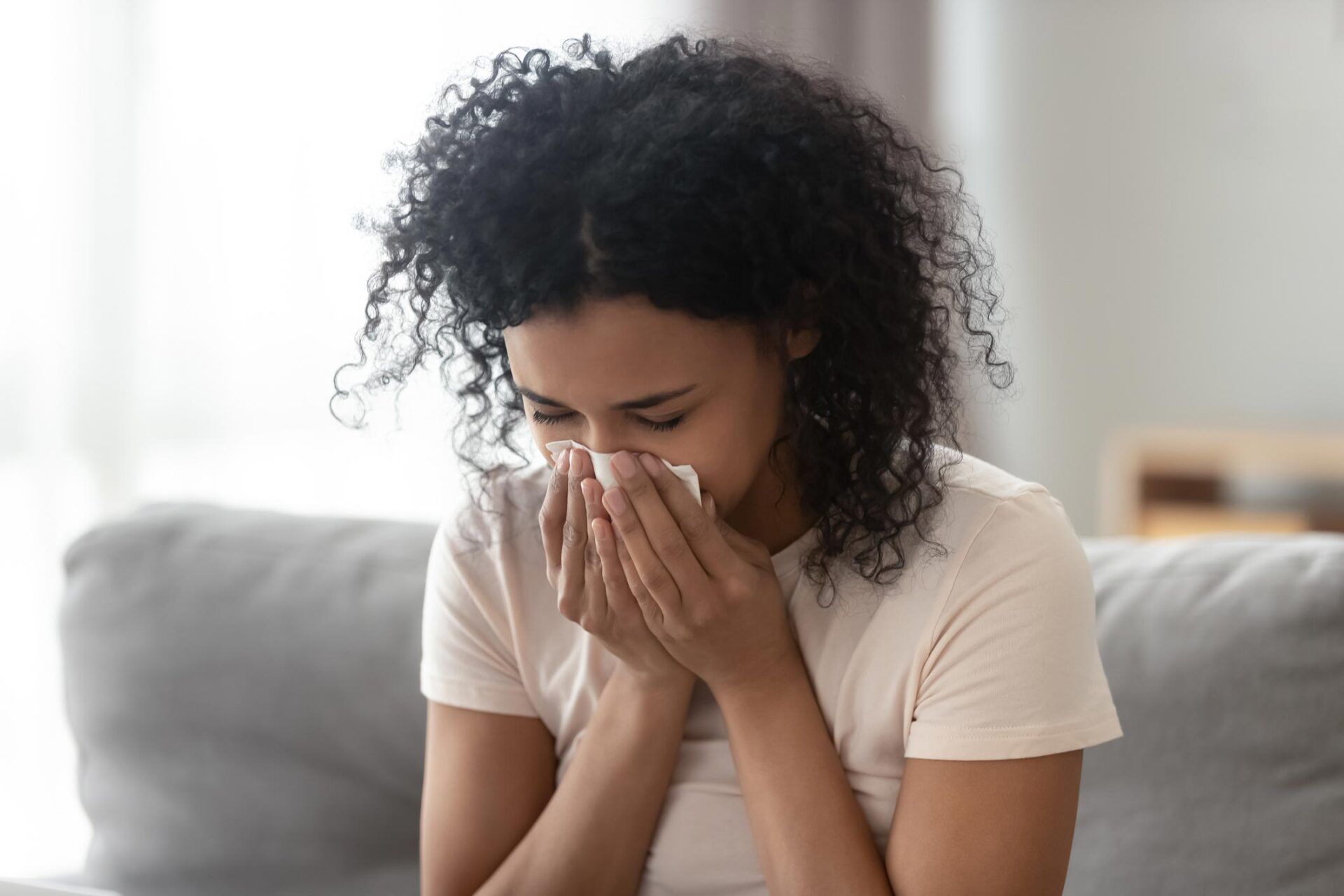 Allergic Woman Blowing Nose — Hot Springs, AR — Jackson Allergy & Asthma Clinic