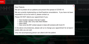 A blurred image of a website that says dear patients