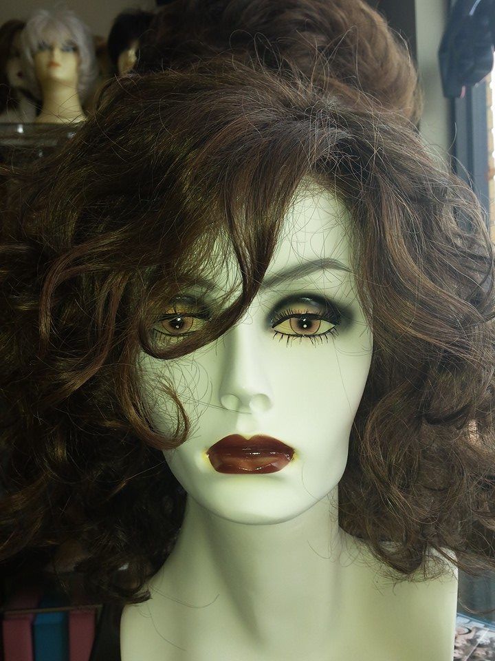 Curly Wig on A Head Mannequin — Strongsville, OH — Wig Studio LLC