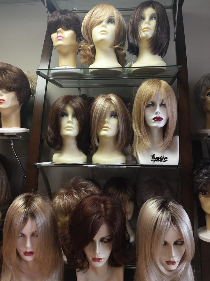 Wigs on A Three Level Shelf — Strongsville, OH — Wig Studio LLC