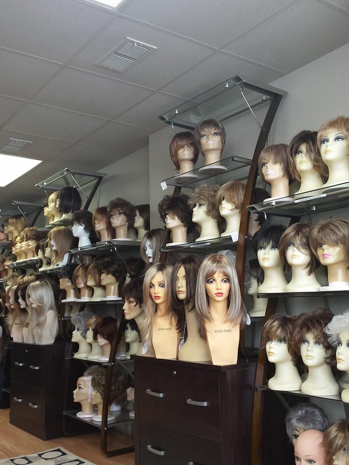 Different Wigs on Shelves — Strongsville, OH — Wig Studio LLC