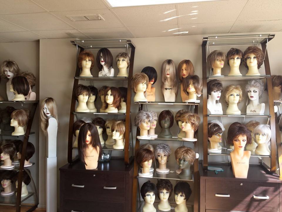 Shelf with Displayed Wigs — Strongsville, OH — Wig Studio LLC