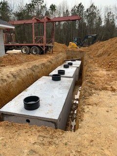 Row Of Septic Tanks — Rocky Mount, NC — Boswell & Son Septic Tank Service Inc.