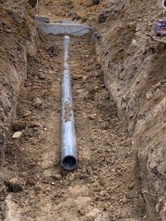 Pipe On Septic Drain Field — Rocky Mount, NC — Boswell & Son Septic Tank Service Inc.