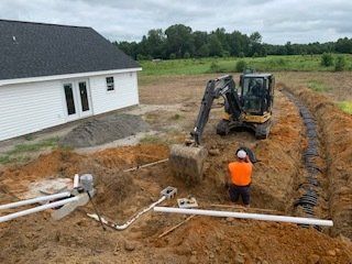 Contractor Using Excavator — Rocky Mount, NC — Boswell & Son Septic Tank Service Inc.