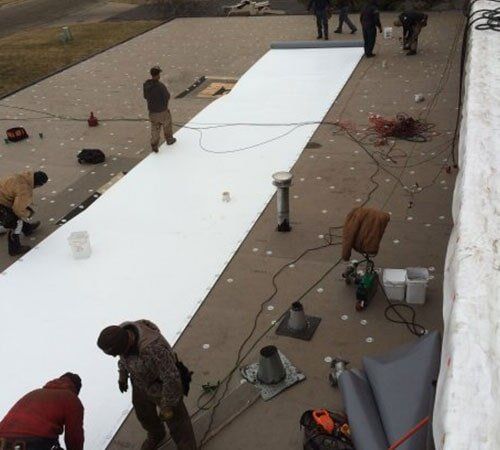 Metal Roof — Workers on Roof in Chicago, IL