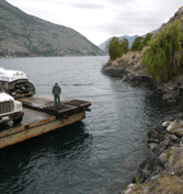 Man With Trucks On The River — Chelan, WA — Jim’s Pumping Services, Inc. Man With Trucks On The River — Chelan, WA — Jim’s Pumping Services, Inc.
