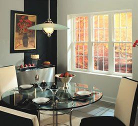 Triple casement windows set in a white dining room Buffalo, NY