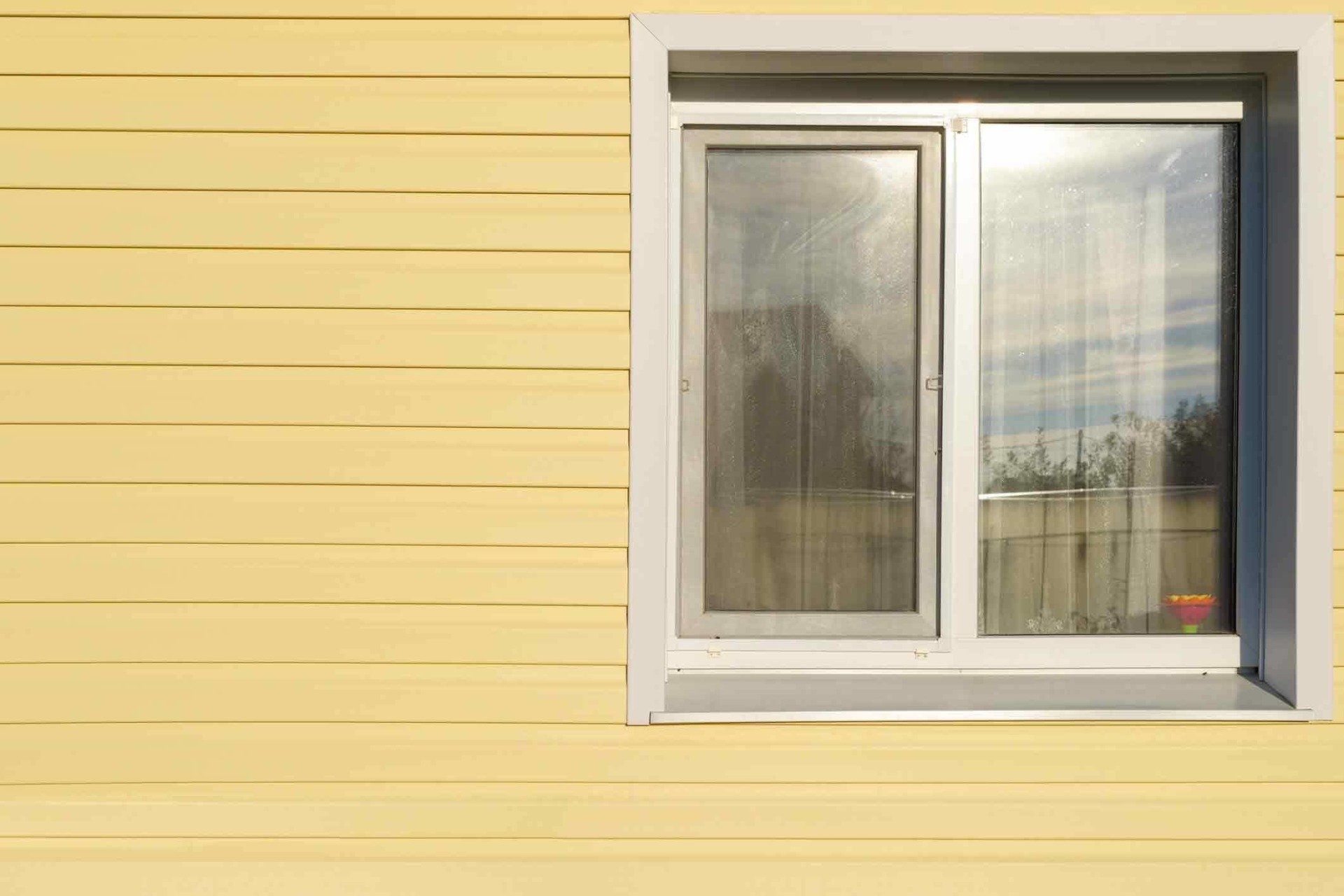 Construction Company Miles City — Yellow Siding in Miles City, MT Construction Company Miles City — Yellow Siding in Miles City, MT