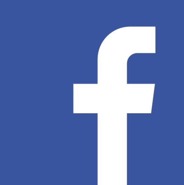 White Facebook “f” logo on a blue background