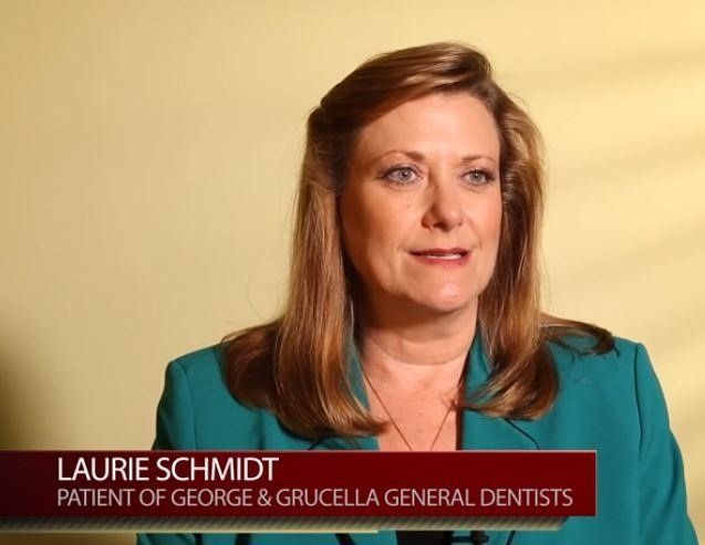 Laurie Schmidt in a teal blazer during a news interview, with a lower-third identifying her as a patient