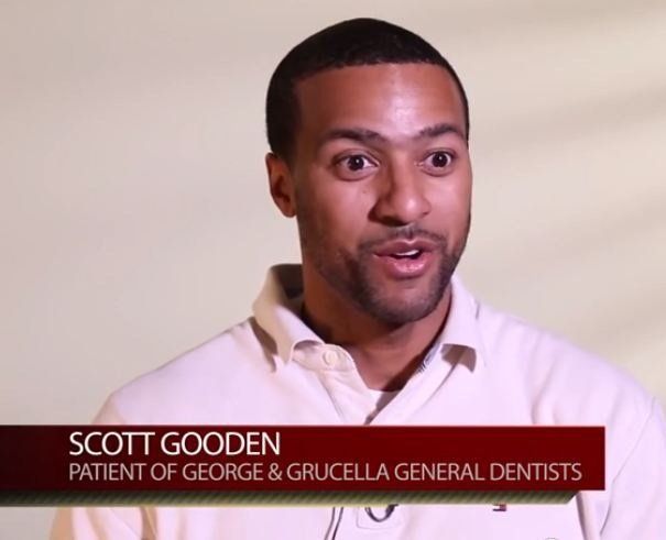 Scott Gooden speaking on a light background, with a lower-third identifying him as a patient of George & Grucella General Dentists