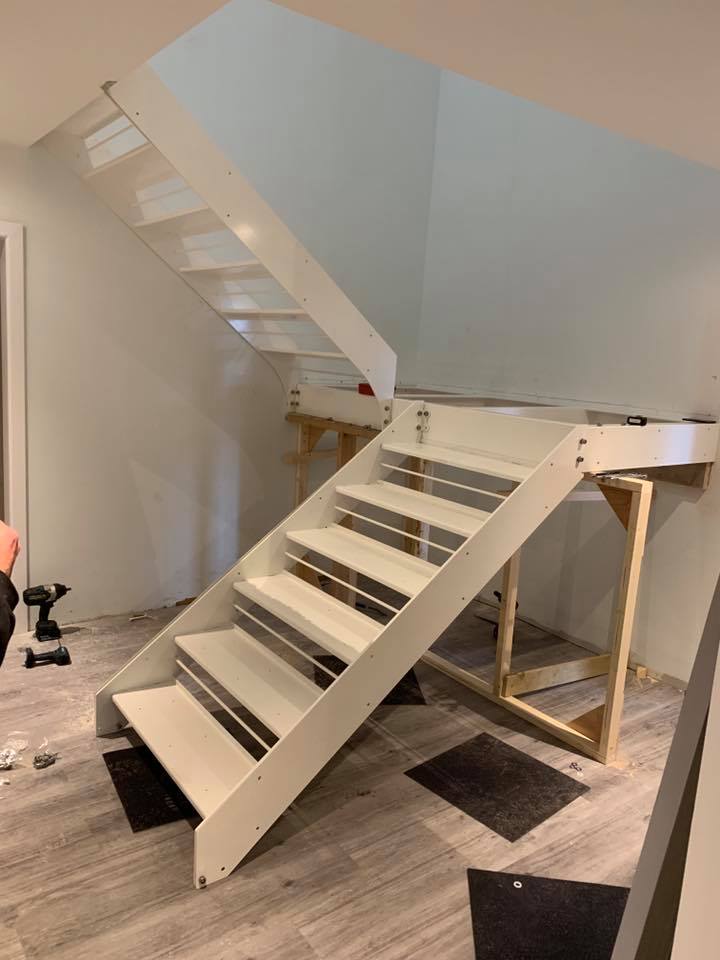 Metal and glass staircase fabricated by MW Engineering & Fabrication Kirkcudbright Dumfries & Galloway Scotland