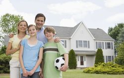 family with insurance services at their house in Hawkinsville, GA