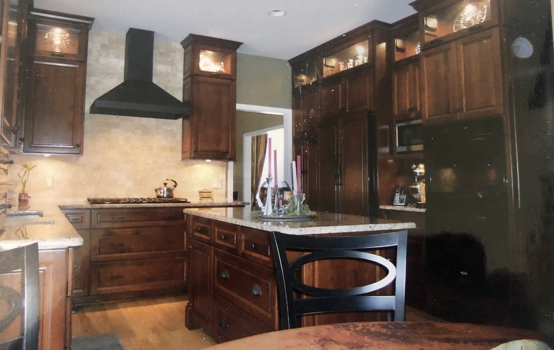 Dark wood cabinets in kitchen