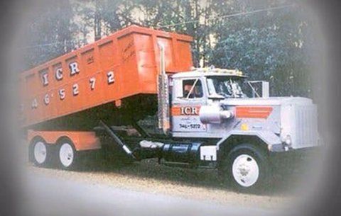 Roll-Off — Orange Truck in Lecanto, FL Roll-Off — Orange Truck in Lecanto, FL
