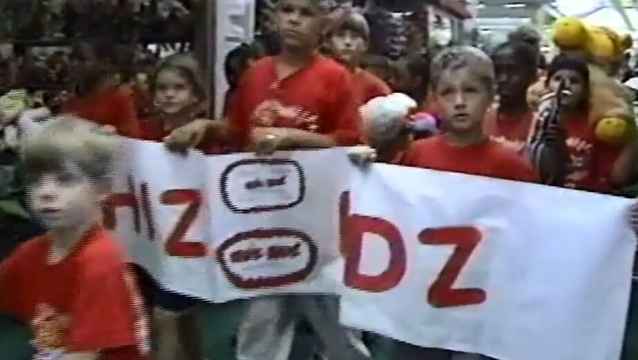 Proudly displaying their School banners at The Buddy Bear® Parade
