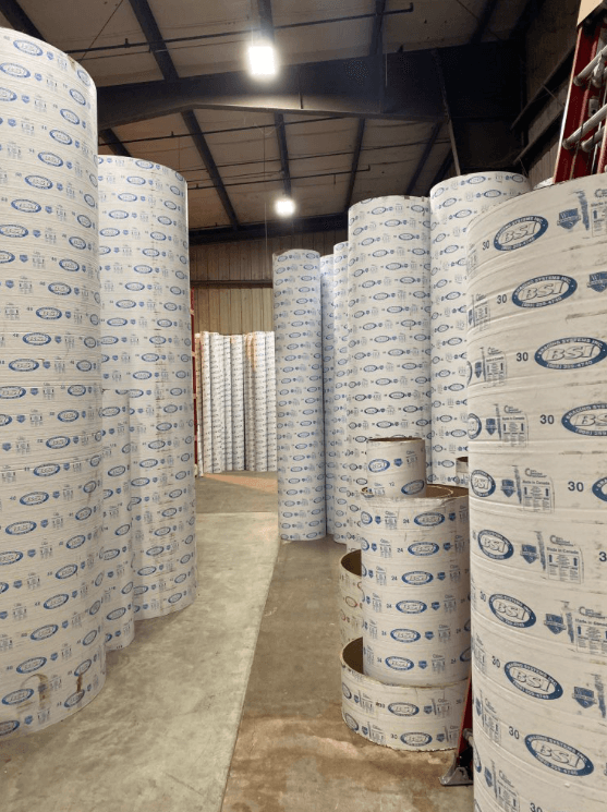 Warehouse storage of rolled concrete curing blankets and insulation used for cold weather concrete protection