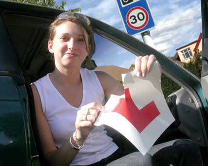 Girl tearing up learner badge