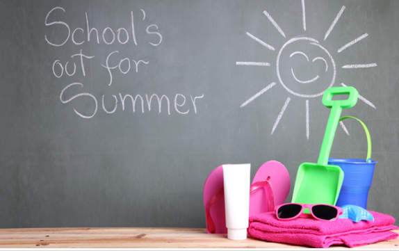 A chalkboard with the words school 's out for summer written on it