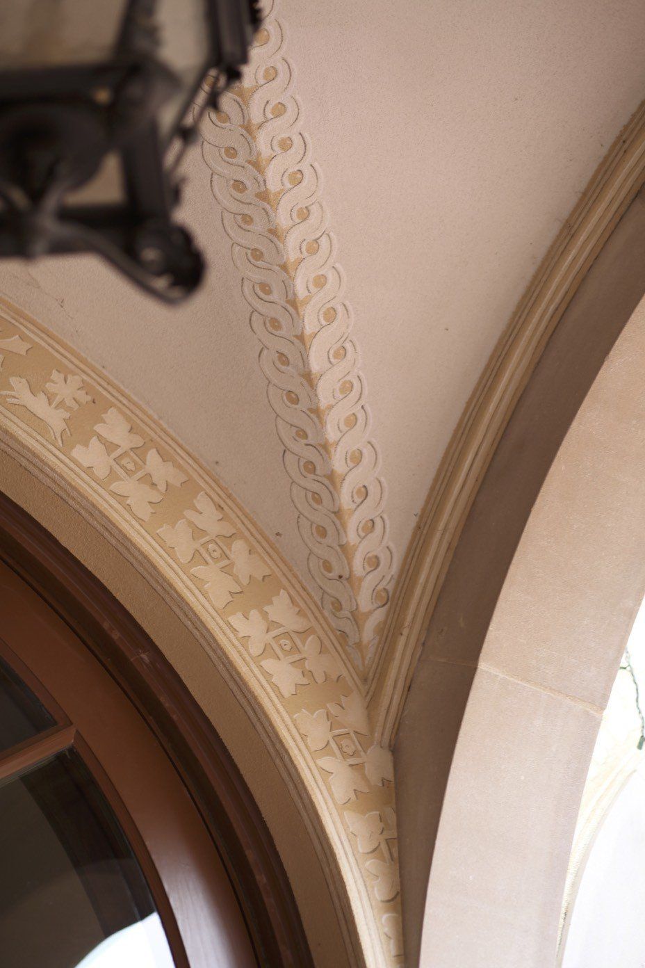A ceiling with a floral design on it
