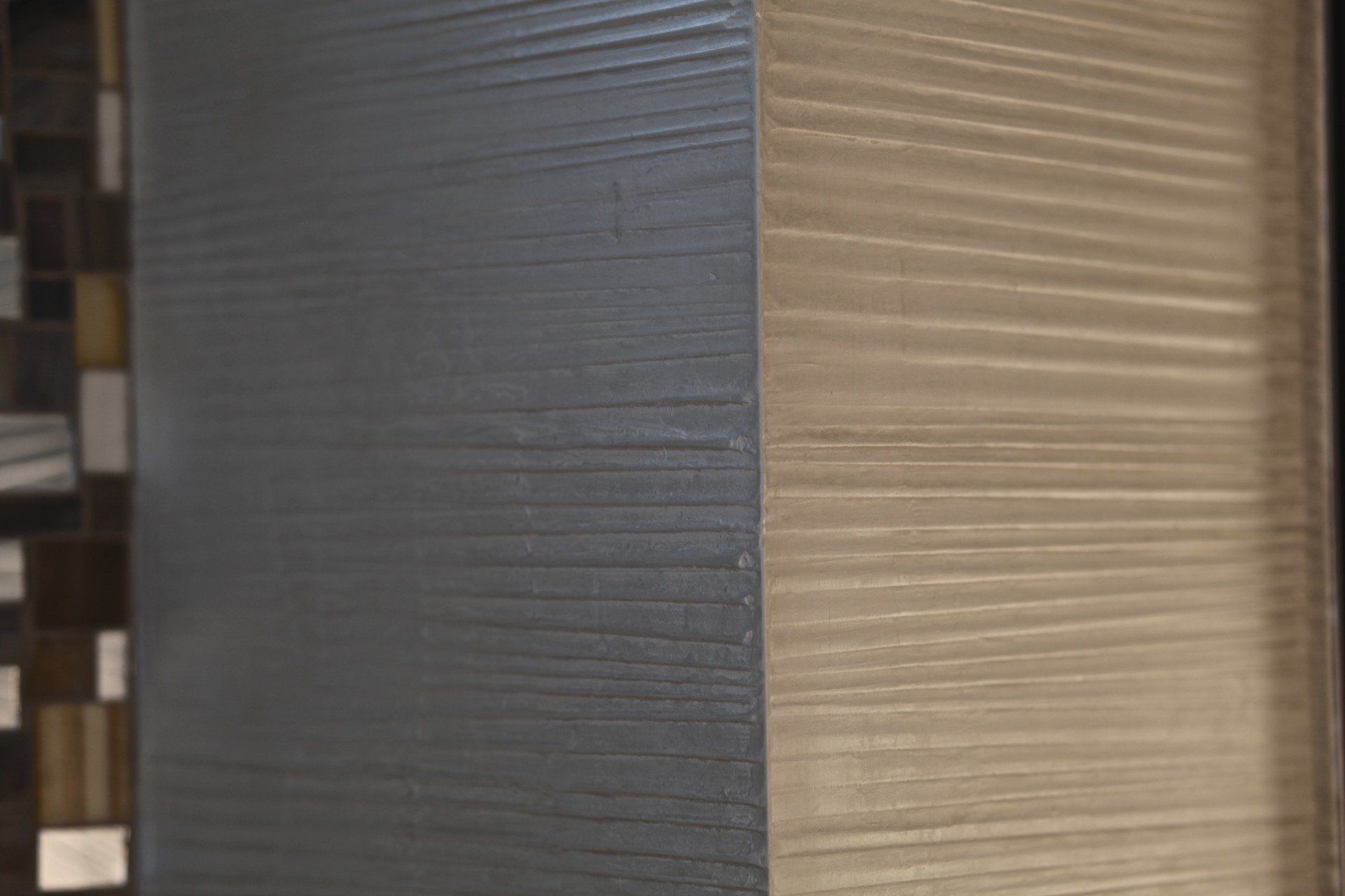 A close up of two pieces of wood next to each other.