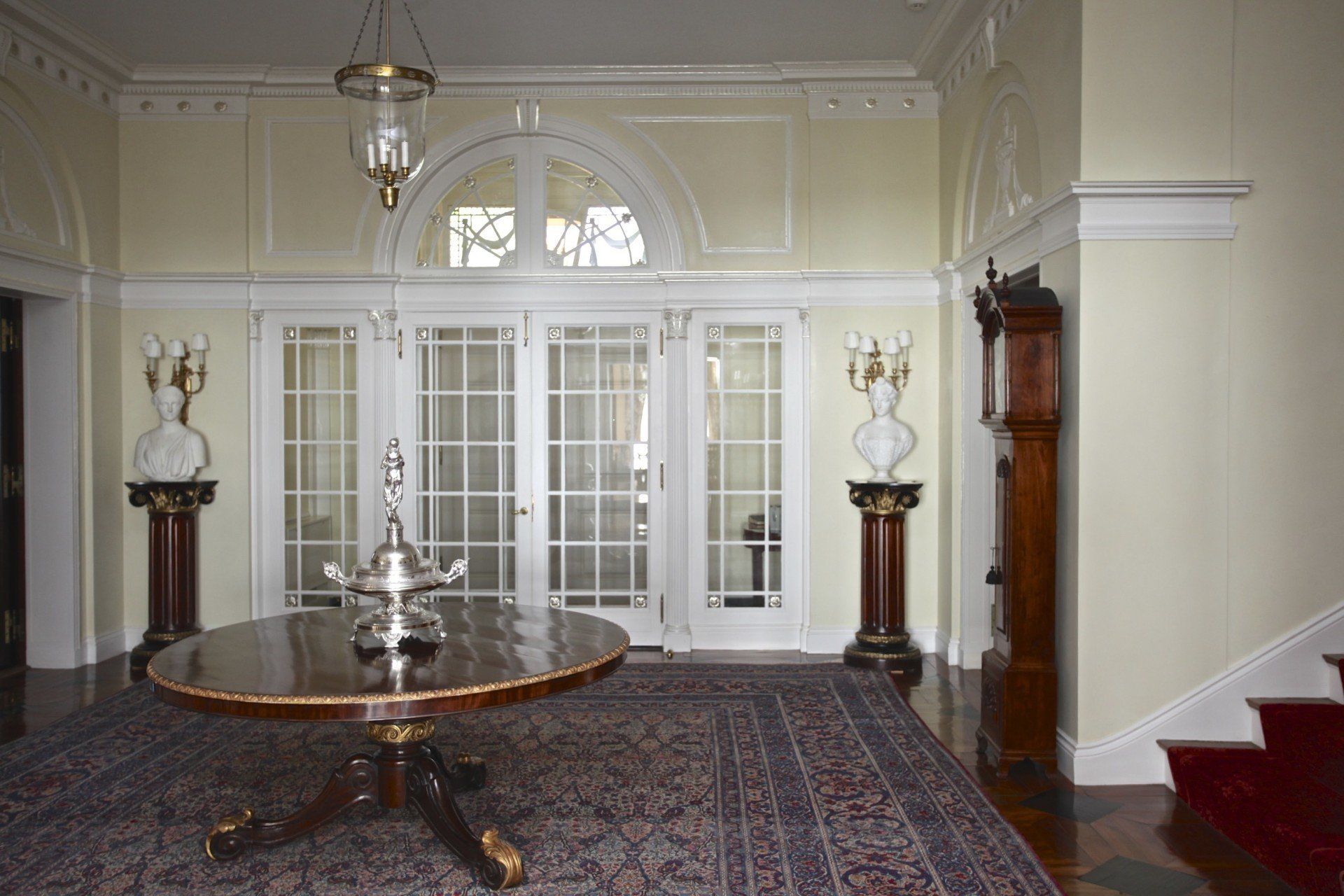 There is a table in the middle of the room.
