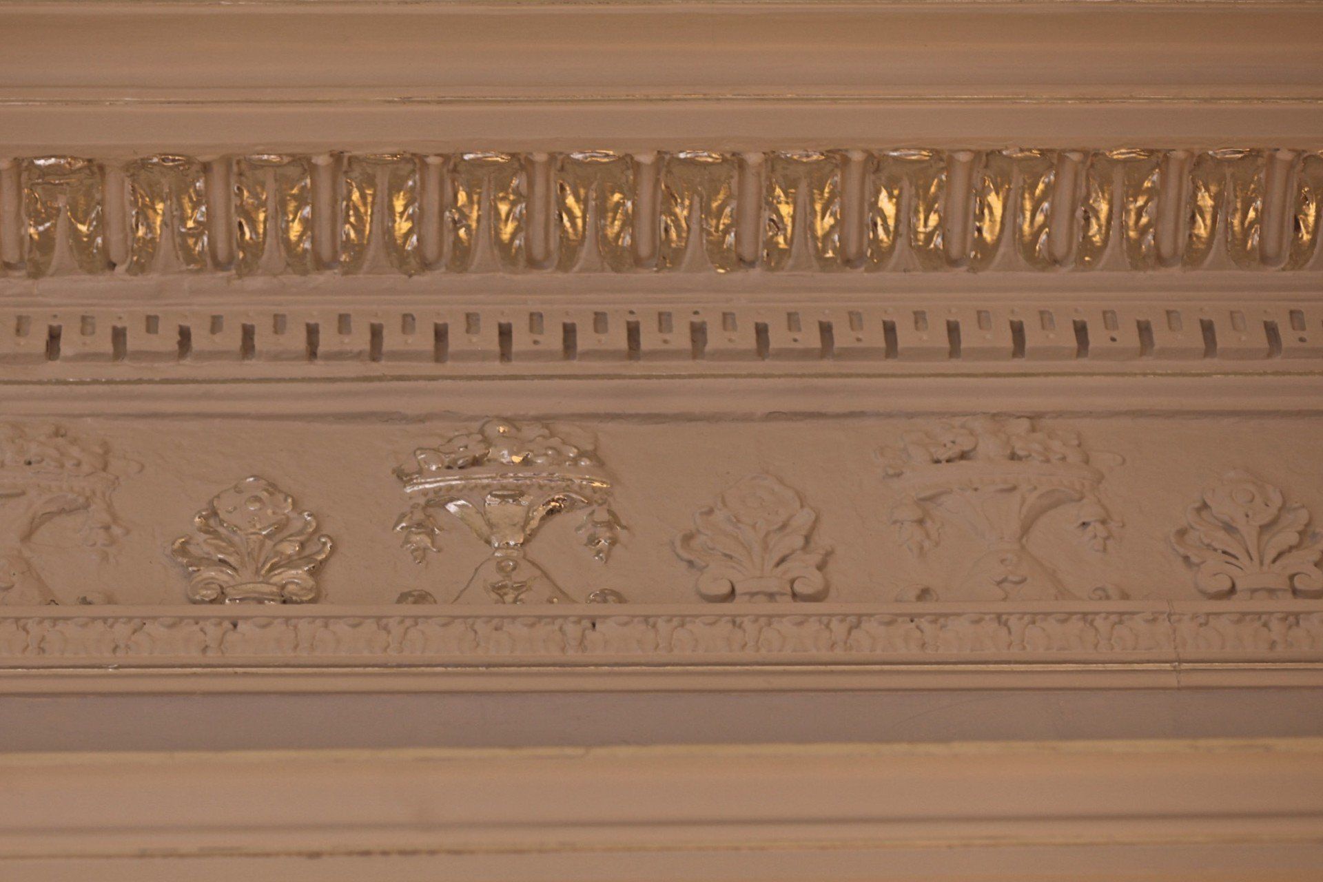 A close up of a molding on a wall.