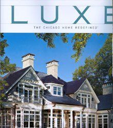 A large house is on the cover of a magazine called luxe.