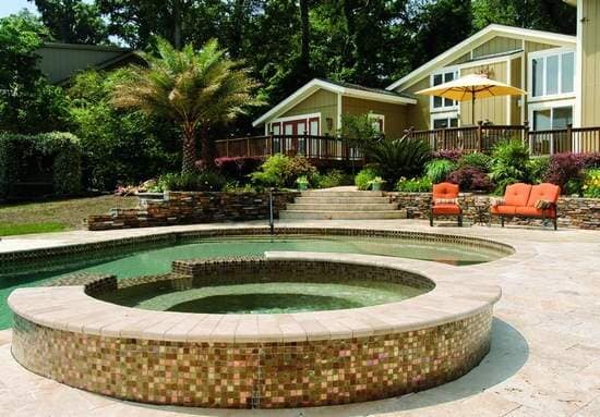 Swimming pool with hand rails — Pool & Patio Services in Fort Walton Beach, FL Swimming pool with hand rails — Pool & Patio Services in Fort Walton Beach, FL