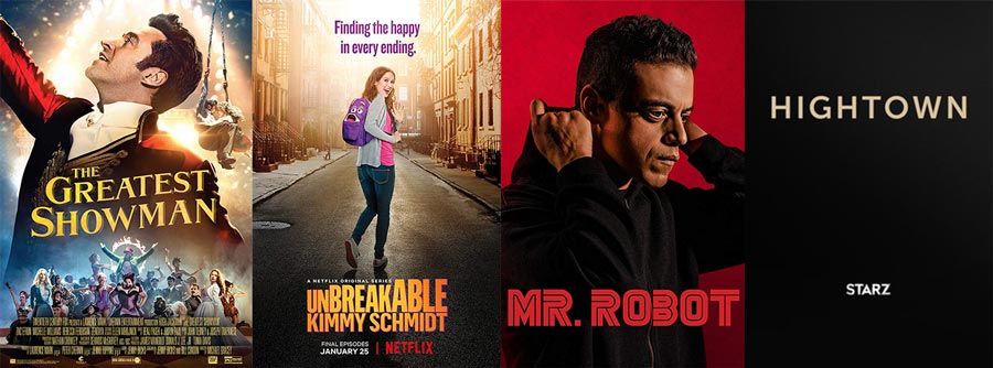 A collage of movie posters including the greatest showman