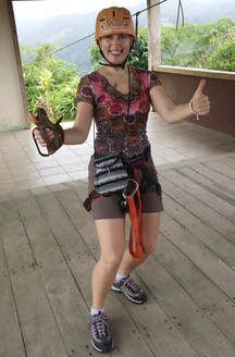 Tamara showing thumbs up sign before going on a zip-line