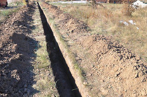 Digging a trench — Greg Thompson Earthmoving in Pink Lily, QLD