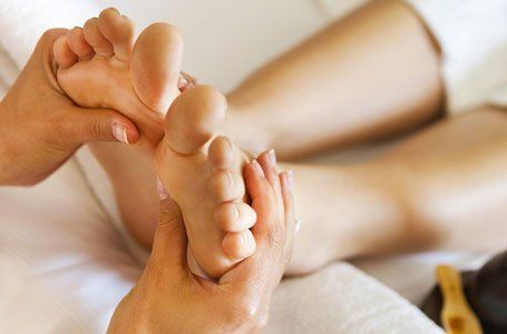 Holding foot