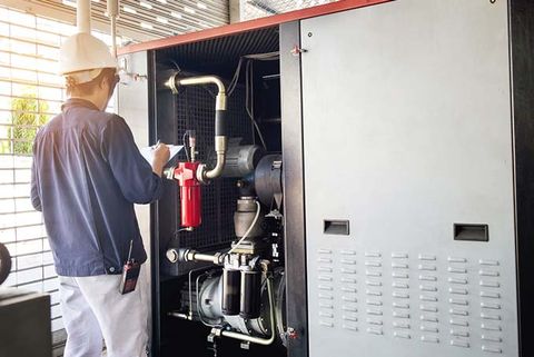 Commercial Hvac — Technician Recording Data in Phoenix, AZ