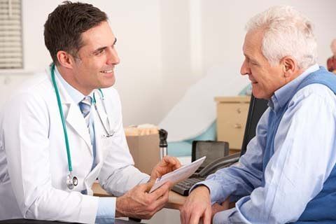 Doctor Talking to the senior man - Health Care Provider In Fayetteville, NC Doctor Talking to the senior man - Health Care Provider In Fayetteville, NC