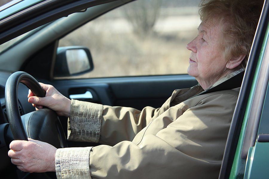 Elderly Woman Driving — Oklahoma City, OK — Freeman Collision Center Elderly Woman Driving — Oklahoma City, OK — Freeman Collision Center