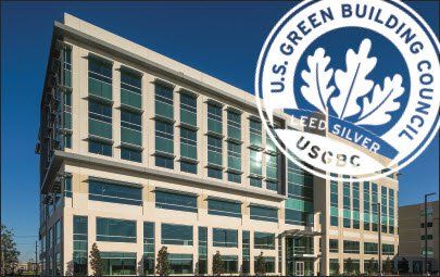A building with a green building council seal on it
