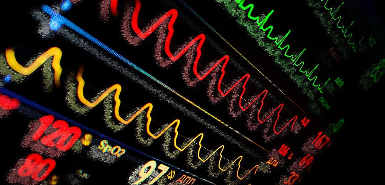 A bunch of colorful lights on a black background