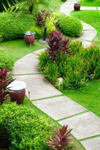 Landscaping Contractor — Garden With Stone Path in Palm Harbor, FL Landscaping Contractor — Garden With Stone Path in Palm Harbor, FL