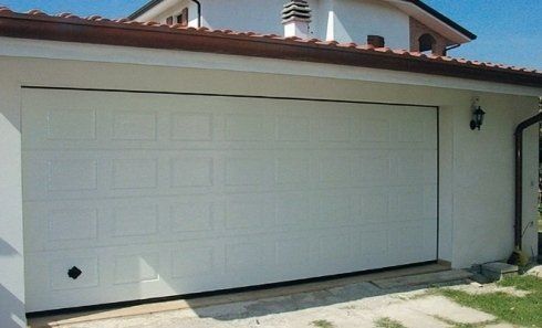 Portoni per garage con finiture d'eccellenza