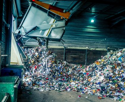 Scrap metal — Tipping recycling into storage shed in Narvon, PA Scrap metal — Tipping recycling into storage shed in Narvon, PA