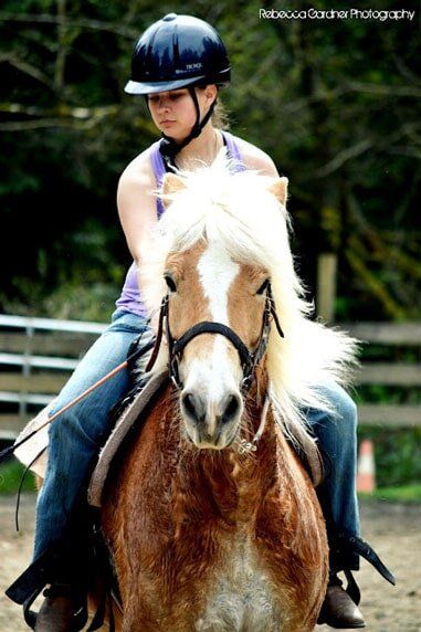 Rider riding horse - Horse riding lessons in Olalla WA Rider riding horse - Horse riding lessons in Olalla WA