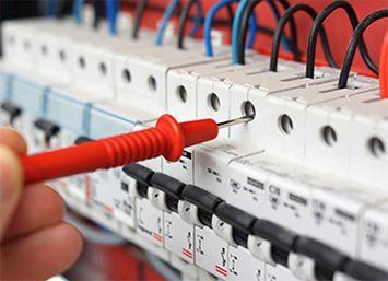 Electrician with multi-meter probe - Electrical Repairs in Cook, MN Electrician with multi-meter probe - Electrical Repairs in Cook, MN