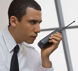 man walkie talkie security