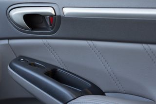 Vehicle Door Panel with Locks and Power Window Buttons Showing - truck accessory store in Valparaiso, IN Vehicle Door Panel with Locks and Power Window Buttons Showing - truck accessory store in Valparaiso, IN