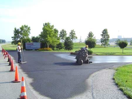 Webster County — Workers Putting Asphalt in Evansville, IN