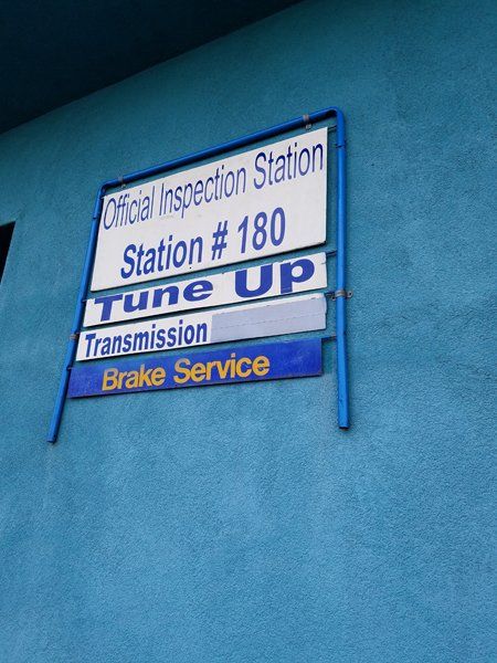 wall mounted official tuneup signage